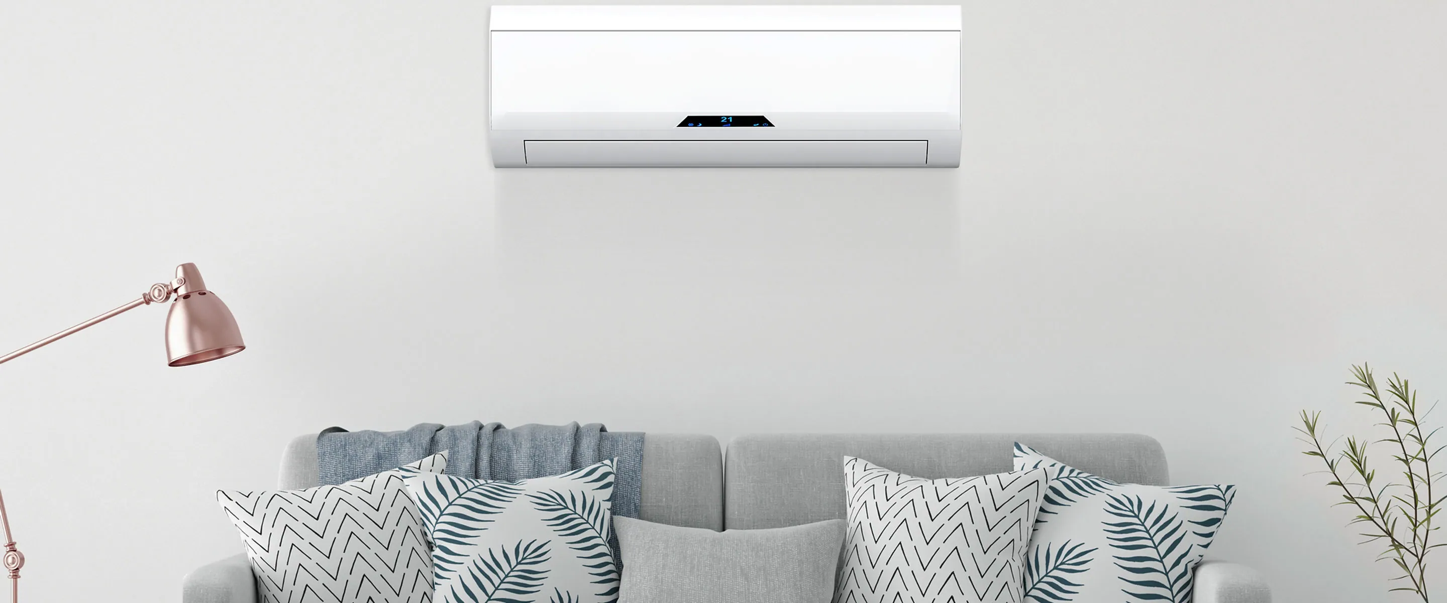 Wall air-conditioner above a sofa in a living room